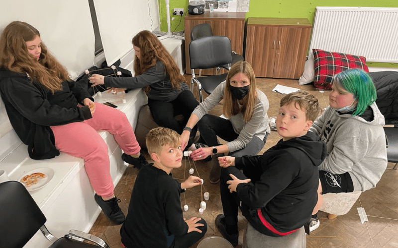 Young people take part in a group activity through The Friary engagement project